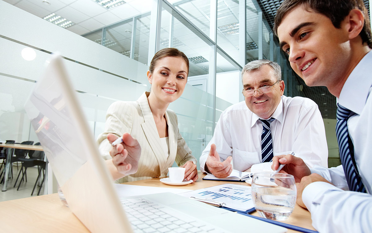 business team working on laptop