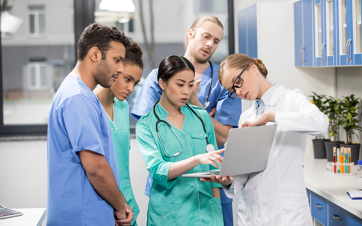 healthcare team working on computer